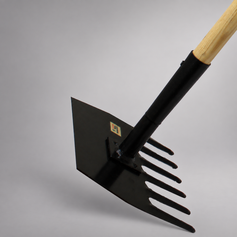 Close-up of Council Tool McLeod head showing sharpened hoe blade and rake teeth