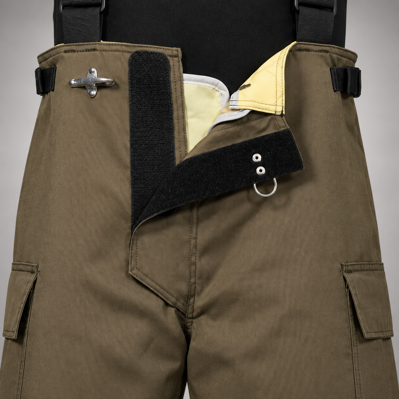 INNOTEX RDG20 pants with the front flap open, showing hook-and-D-ring closure, lining, waist-adjustment straps and suspenders.