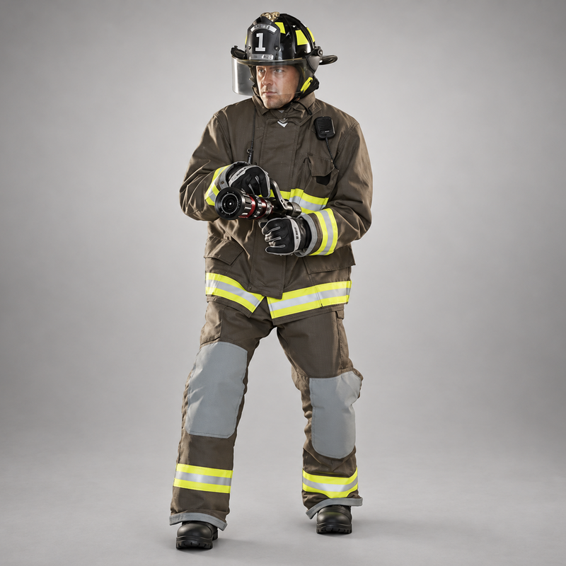 Firefighter wearing khaki INNOTEX RDG20 turnout pants with gray knee reinforcements and reflective leg trim, paired with a matching coat