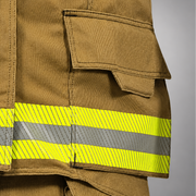 INNOTEX RDG40 coat lower pocket with flap and pull tab above lime-yellow and silver reflective trim.