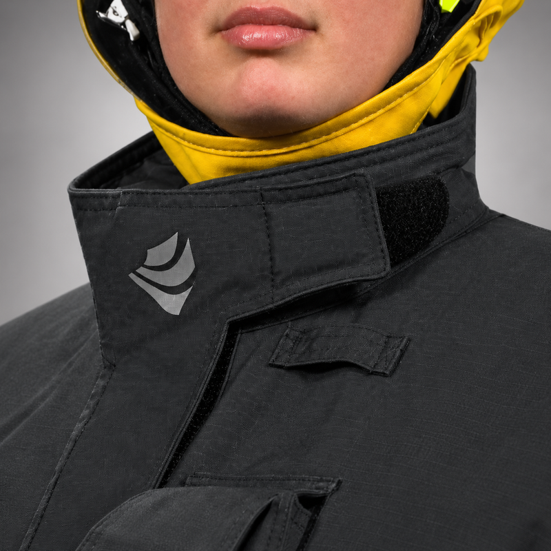 Close-up of the INNOTEX RDG50 coat sleeve cuff and black knit wristlet with thumb opening.