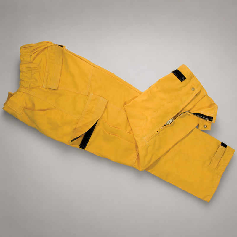 Angled view of Strike Team Tecasafe Plus wildland firefighting brush pants showing cargo pockets and lower-leg zipper closures