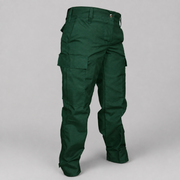 Spruce green tactical cargo pants shown from the back on a light gray studio background.