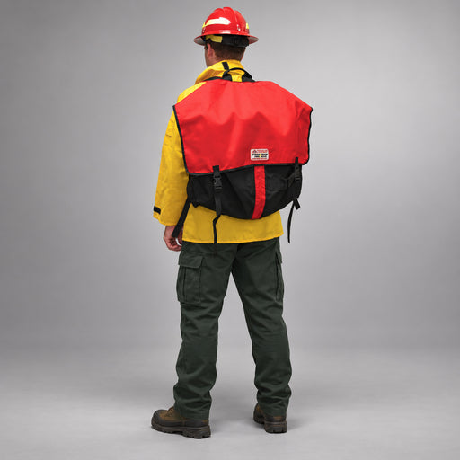 Firefighter wearing the red Strike Team Applegate Hose Pack with black base, red center webbing and quick-release buckles.