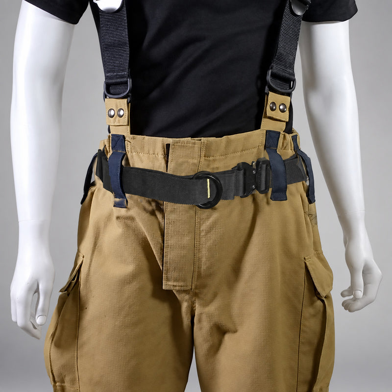 Fire Innovations Arapaho NFPA escape belt and Class II harness worn over turnout pants on a gray studio background