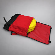 Red Strike Team Cascade Hose Pack opened to show coiled yellow wildland hose, flap closure and black reinforced base.