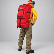 Firefighter wearing the red Strike Team Crew Pack to demonstrate its backpack-style carry.
