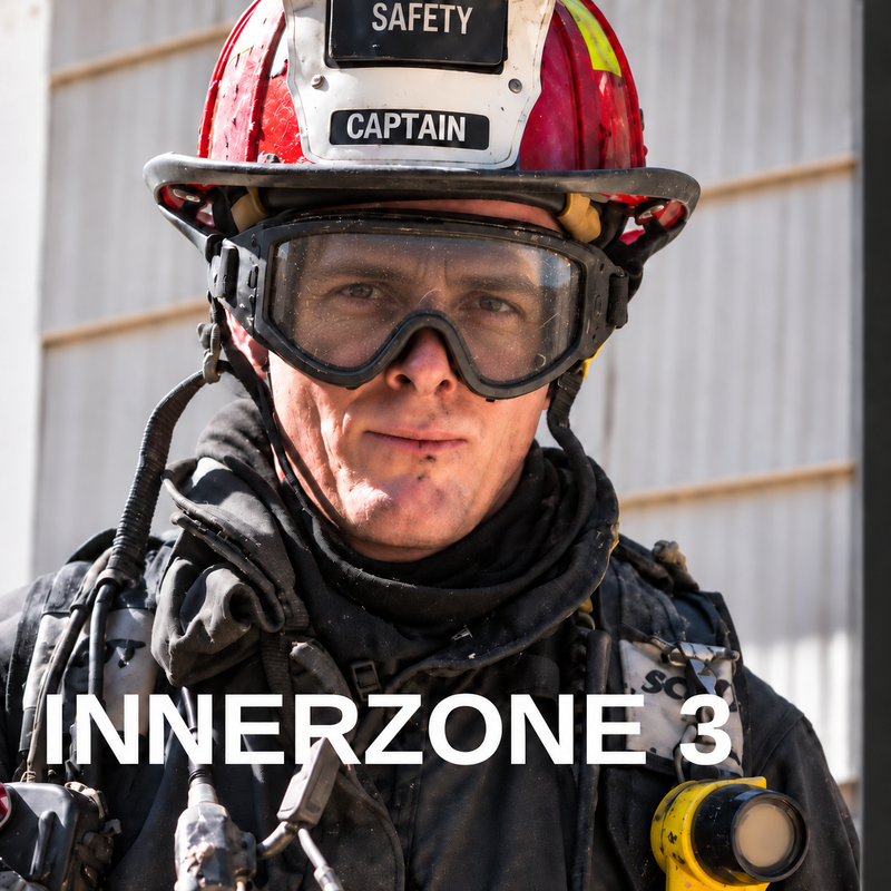 ESS Innerzone Structural FS goggles secured around a structural fire helmet
