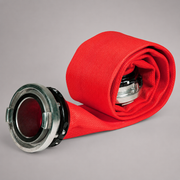 Red fire hose fitted with metal Storz couplings as an application example