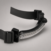 A black Foxfury headlamp with a clear LED light bar, shown on a neutral gray background.