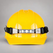 FoxFury Discover helmet light mounted on a yellow hard hat