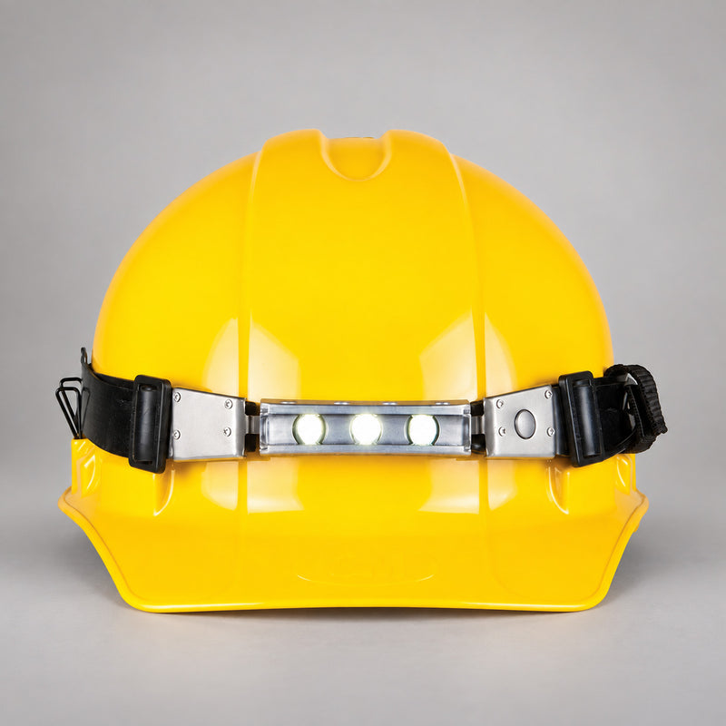 FoxFury Discover helmet light mounted on a yellow hard hat