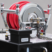 Hannay booster reel with red hose and installed roller guides