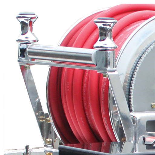 Hannay hose roller and spool assembly installed in front of a booster hose reel