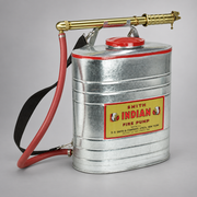 Indian galvanized steel backpack fire pump with hose, brass slide pump, and shoulder strap
