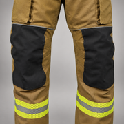 INNOTEX RDG40 turnout pants showing reinforced knee panels and reflective lower-leg trim