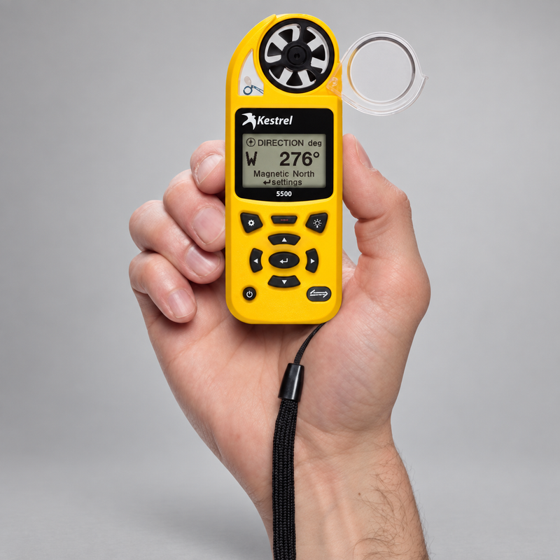 Yellow Kestrel 5500 held in one hand with the impeller cover open