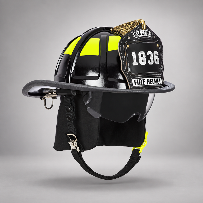 Black MSA Cairns 1836 fire helmet with clear Defender visor, black Nomex earlaps, carved eagle front holder and lime-yellow Scotchlite trim
