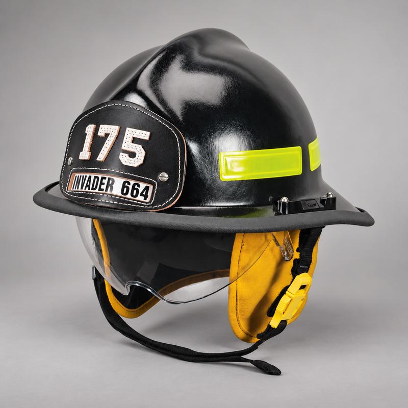 Black MSA Cairns Invader 664 structural fire helmet with clear faceshield