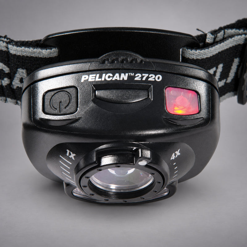 Close-up of Pelican 2720 headlamp controls and variable-focus lens