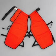 Interior view of PGI five-ply orange forestry chaps showing protective leg panels and straps