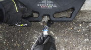 Gloved hand connecting a hose to the protected air inlet on an LT ONE lifting bag