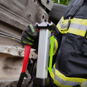 Firefighter extending a RESQTEC RAVE Strut with automatic locking