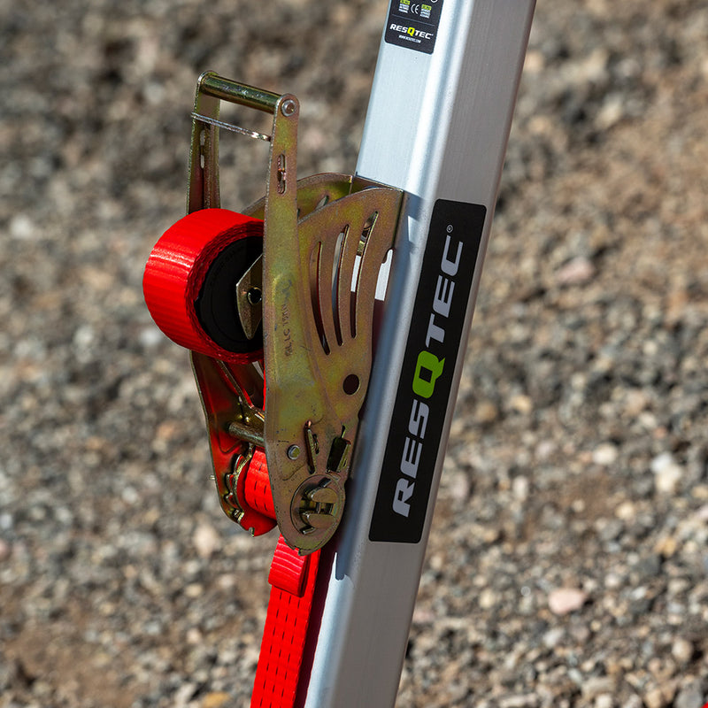 Close-up of the RAVE Strut release area, red strap and ratchet hardware