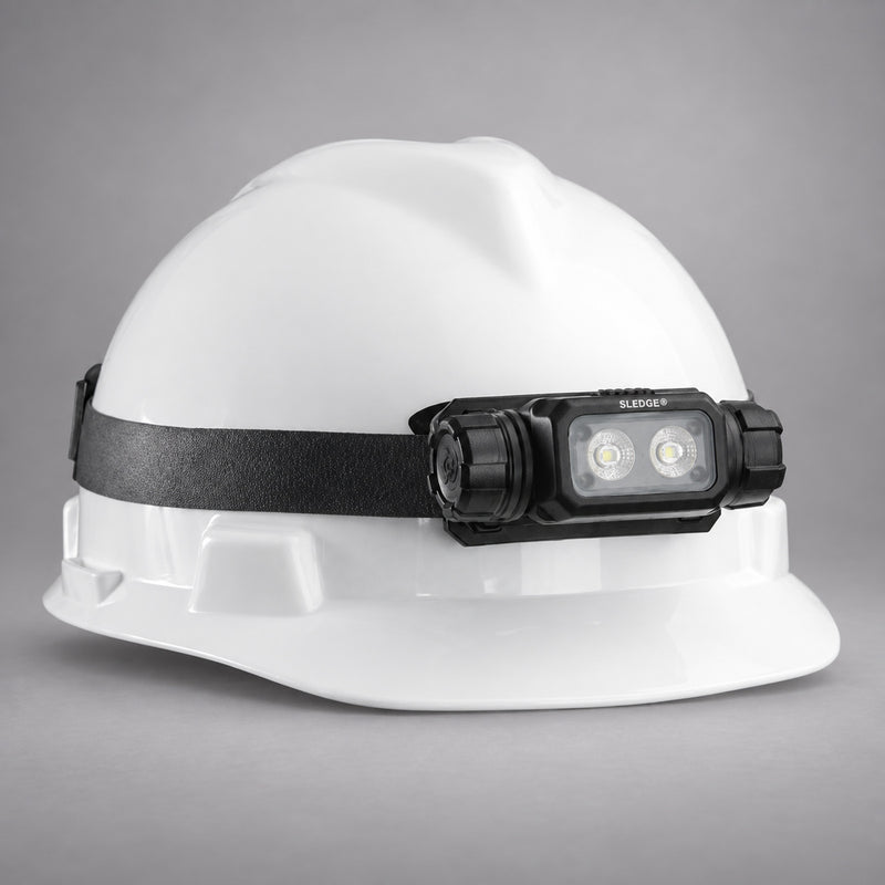 Streamlight Sledge headlamp mounted on a white hard hat