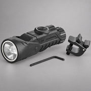 Black Streamlight Vantage 180 X with helmet bracket and hex key on warm gray background