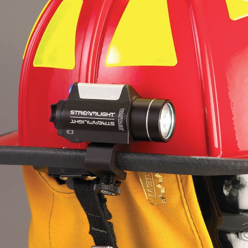 Streamlight Vantage mounted above the brim of a red firefighter helmet