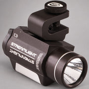 Original front product view of the Streamlight Vantage helmet-mounted LED light on warm gray background