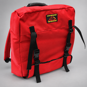 Front three-quarter view of the closed red Strike Team Fed Wildland Hose Pack with molded handle and quick-release buckles.
