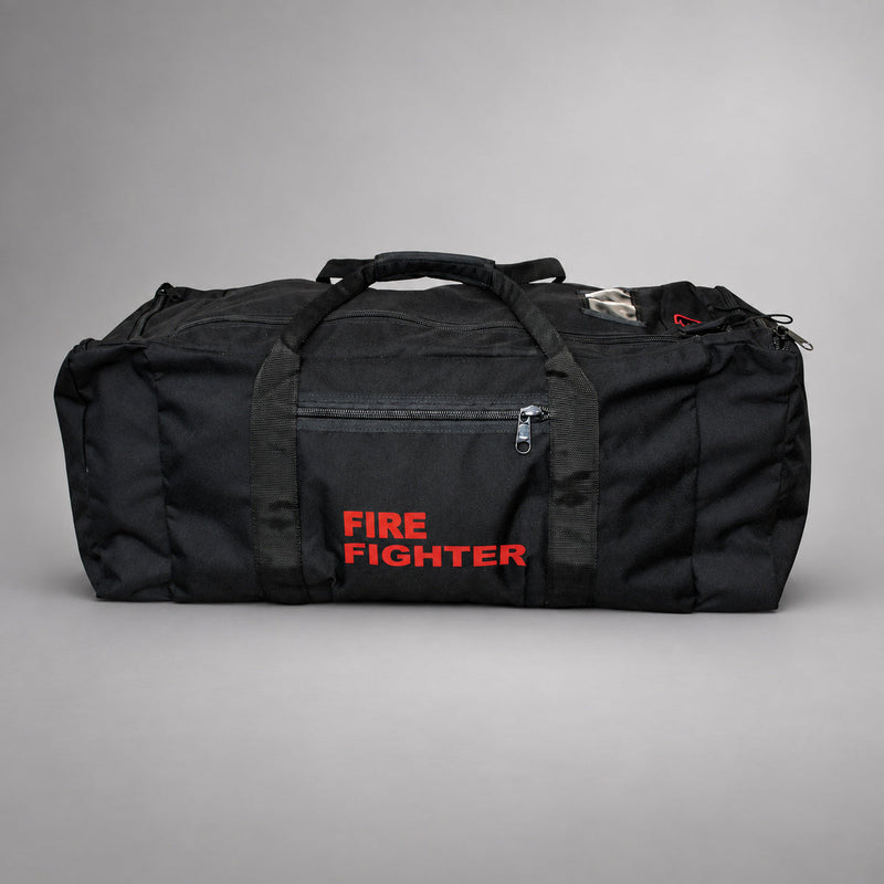 Black Strike Team Deluxe Gear Bag with end cargo pouches, black webbing handles and red FIRE FIGHTER lettering.