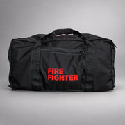 Black Strike Team Extra Large Gear Bag with black webbing handles, zippered side pocket and red FIRE FIGHTER lettering.