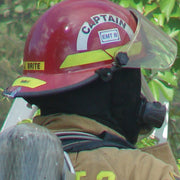 Captain helmet crescent on a firefighter’s red helmet; application example