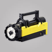 Streamlight Portable Scene Light folded for transport with yellow housing and carry handle